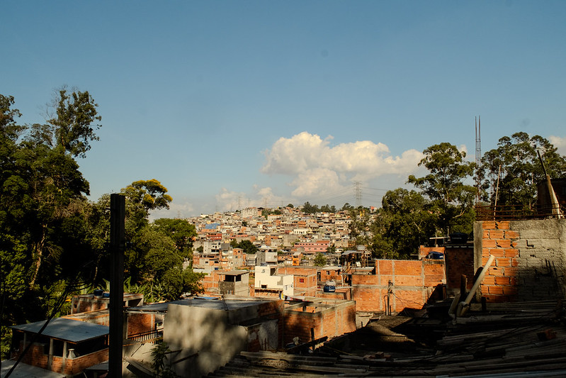 View of a favela with high housing density, highlighting the extent of the housing emergency in Brazil.